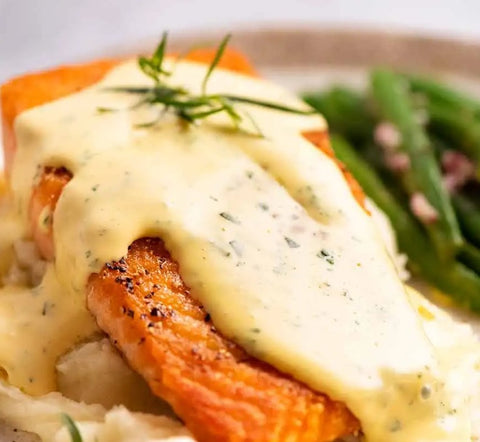 Grilled salmon with Béarnaise sauce mashed potato and vegetables